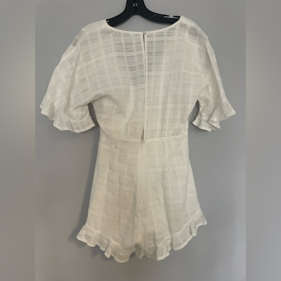 SAINTS & Secrets Flowy Romper with Sinched Waist Tie Front - Picture 4 of 9